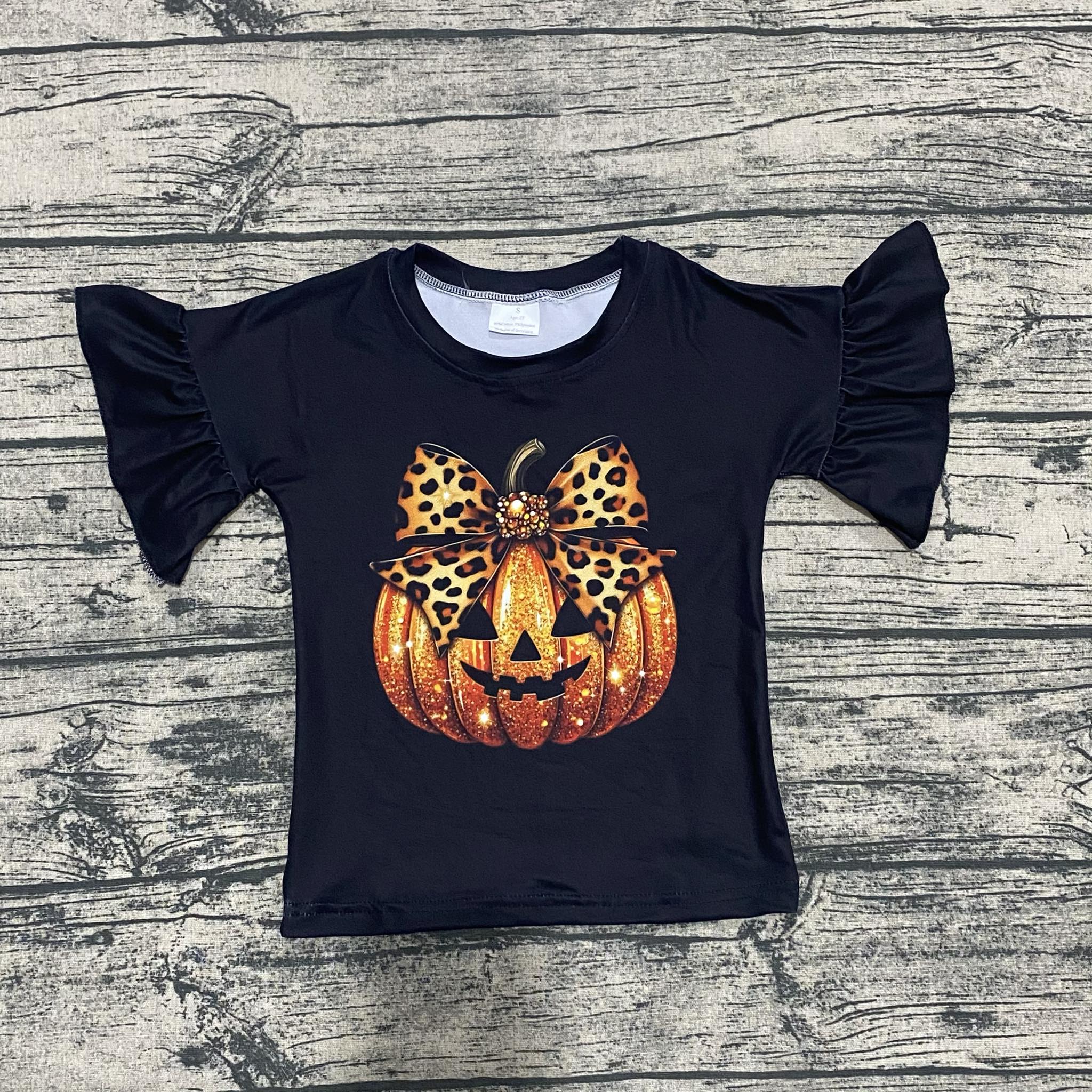 Pumpkin bow ruffle top