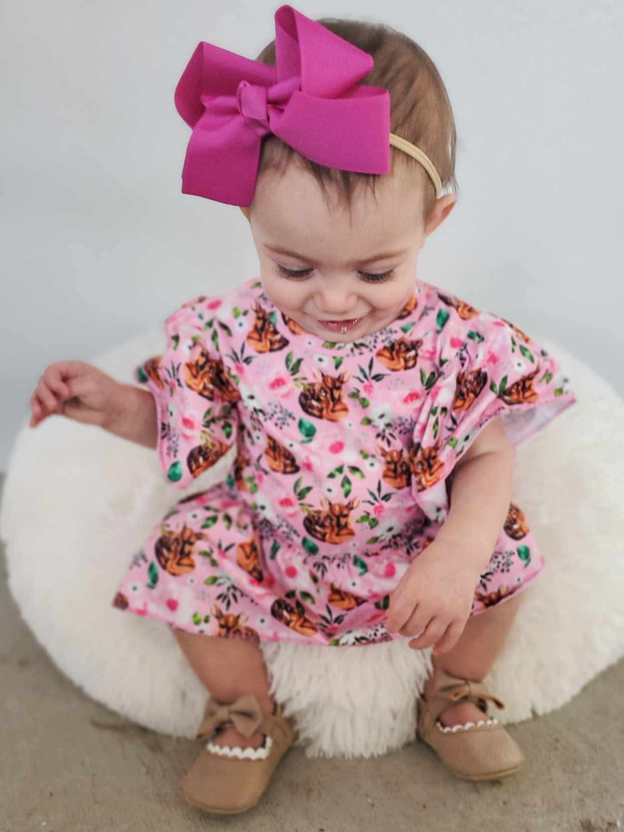 Pink fawn skirted romper