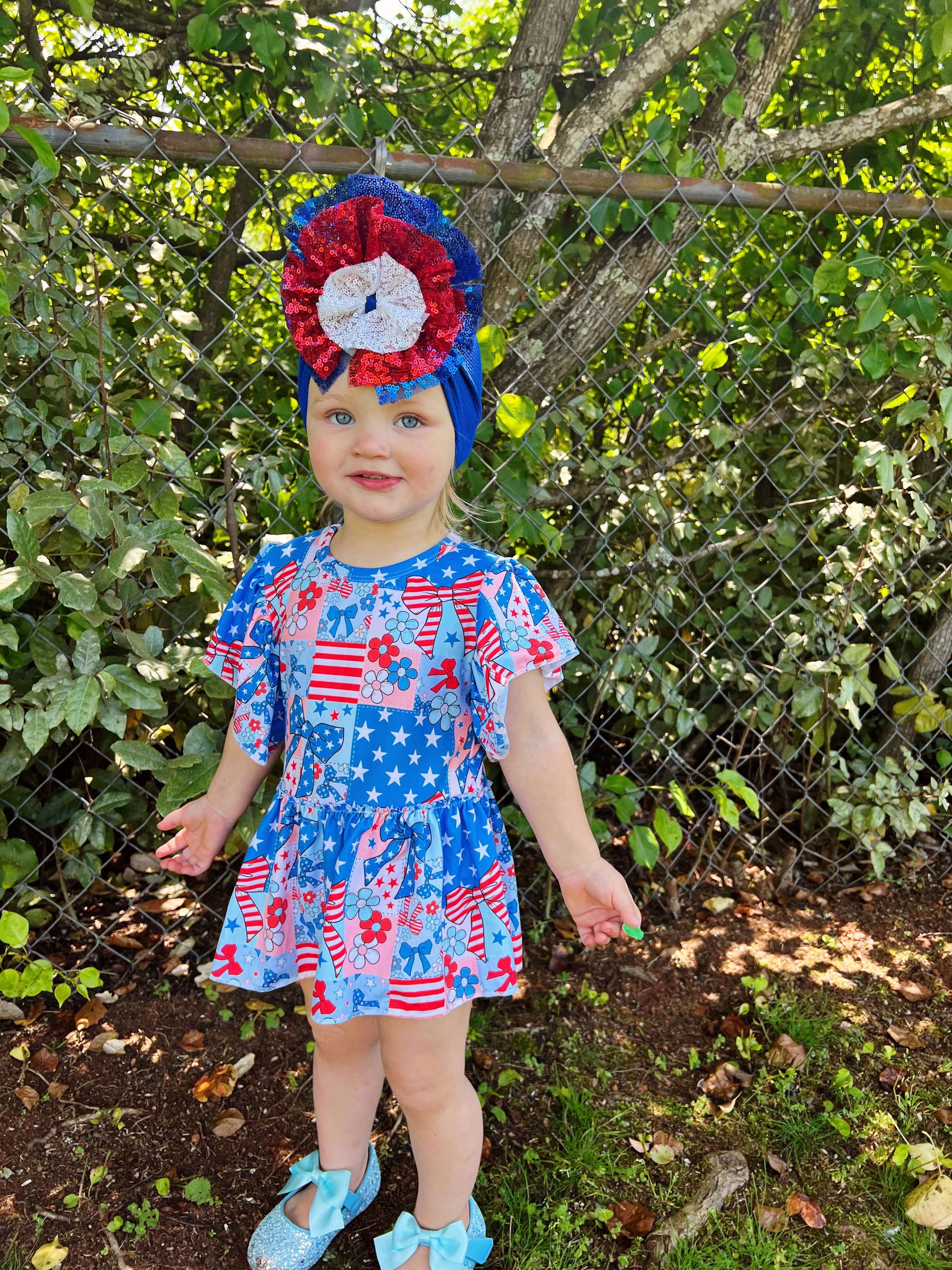 Blue USA bows skirted romper