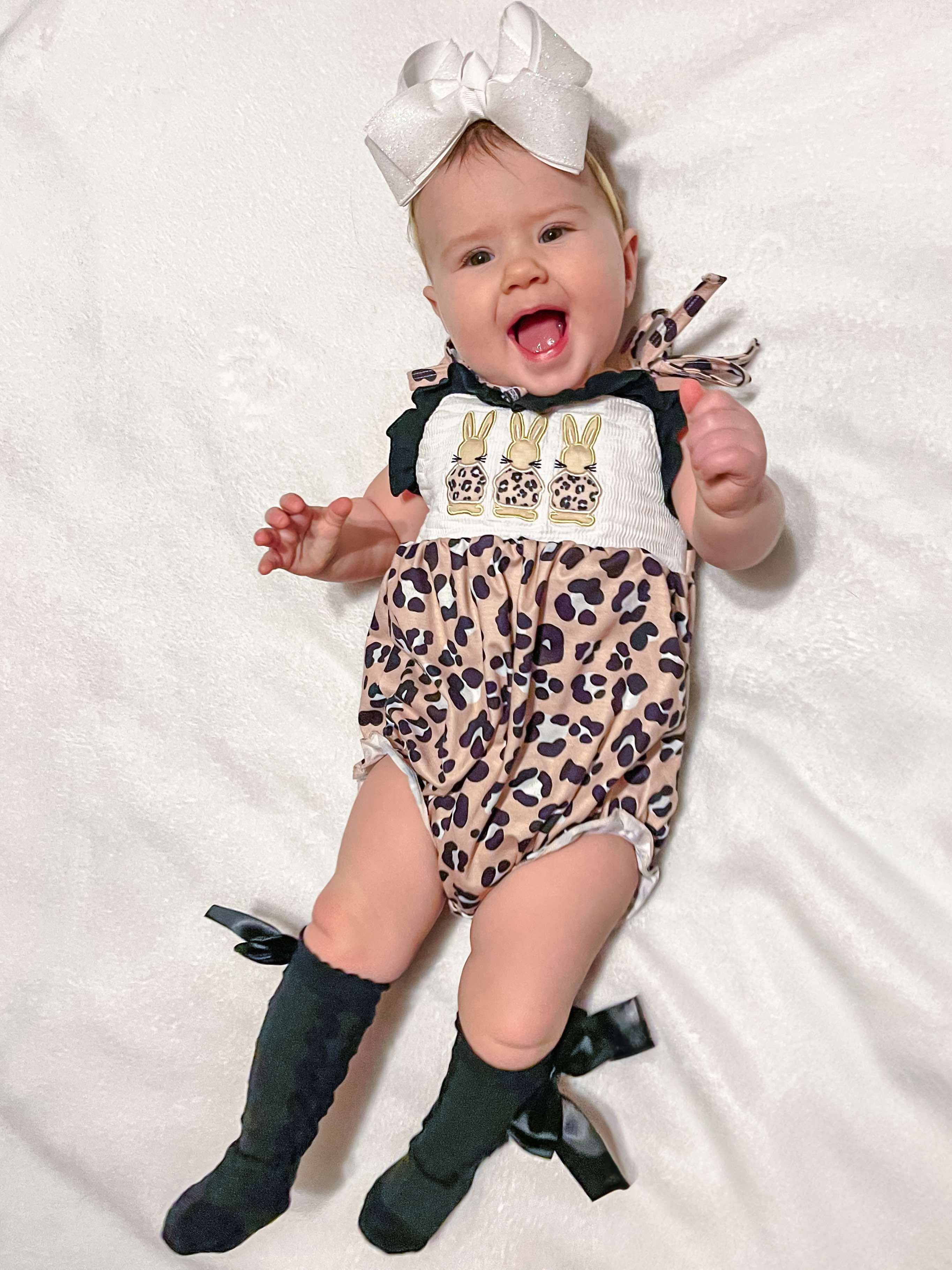 Smocked leopard bunny tie romper