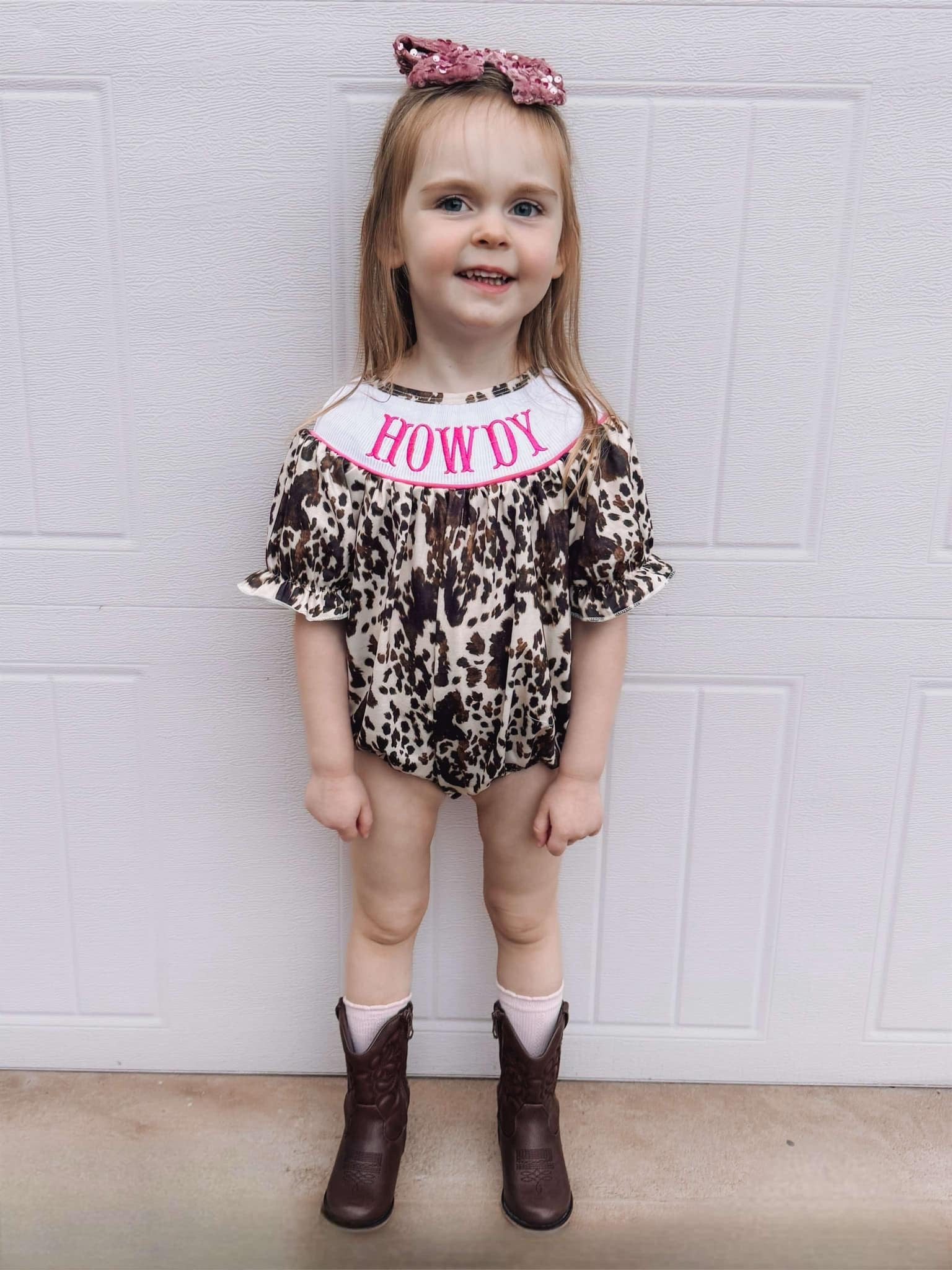 Smocked cowhide howdy romper