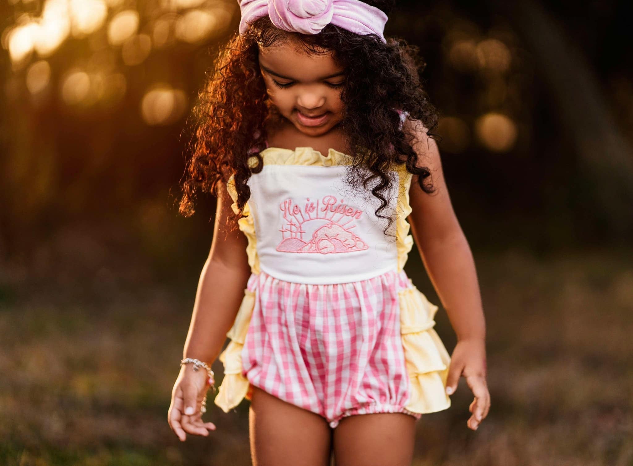 He is risen ruffle romper