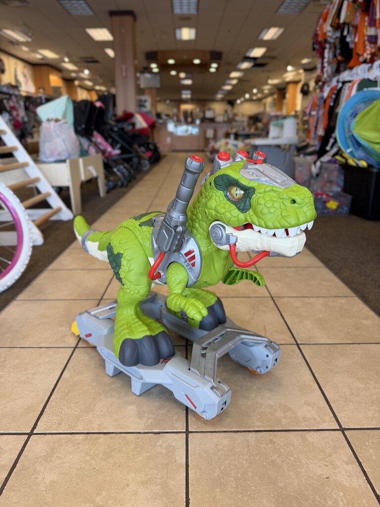 Dinosaur ride on with lights, sounds, and steam